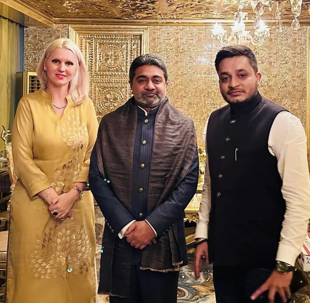 Nitish Jindal standing with Abhishek Verma and Anca Verma in a three-person portrait.